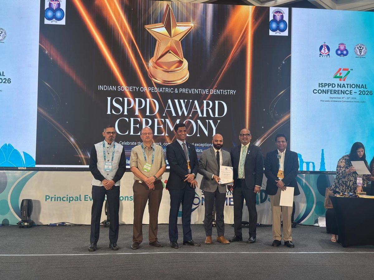 Our HoD at the ISPPD conference, Delhi (2026), receiving the award the Department won for World Oral Health Day celebration